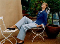 Right -Laura Ashley Spring/Summer 2006 Fashion Atlantis blue swing jacket, white cotton blouse & blue & white cotton trousers.  Jacket �55, Blouse �65 & Trousers �60. 